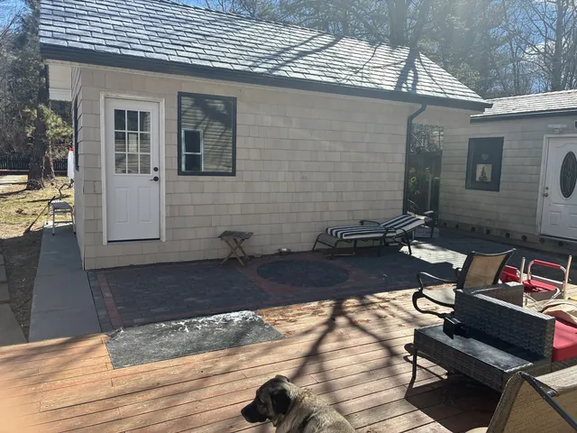 Backyard studio with wood deck
